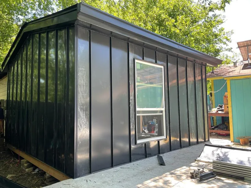 Black standing seam metal wall panels for Roof Inspection in Port Angeles